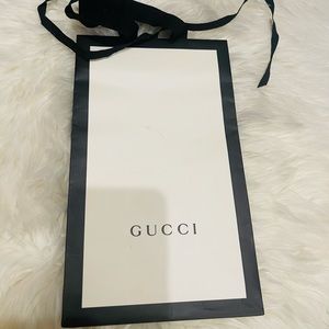 Vertical Gucci gift bag
